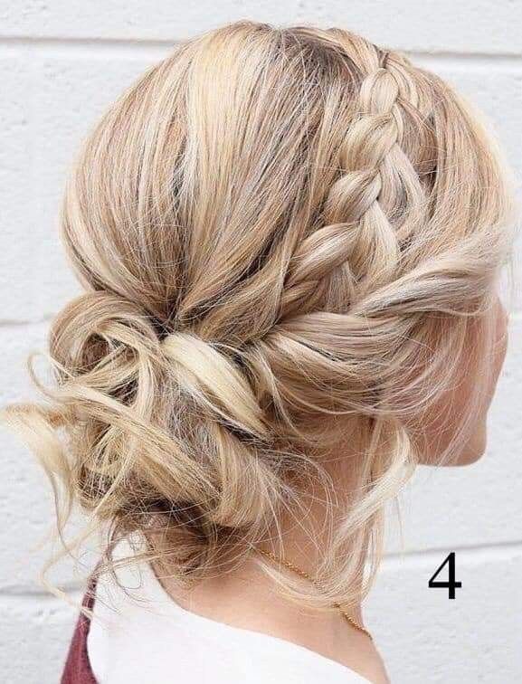 Half up hairstyle with soft waves and pearl pins placed throughout for a modern and romantic bridal finish