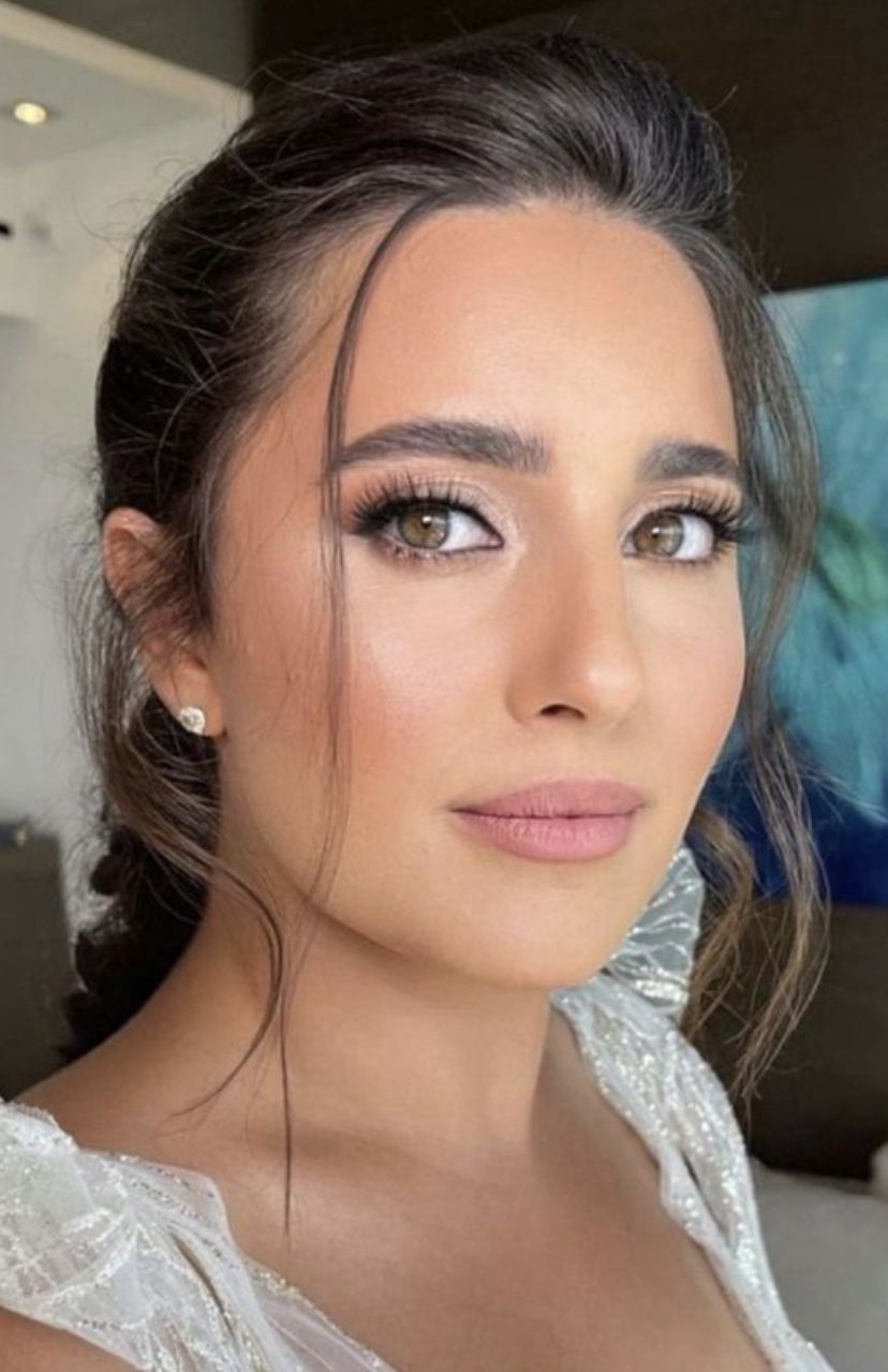 Cool-toned frosted mauve shadow paired with a matte mauve lip. 

