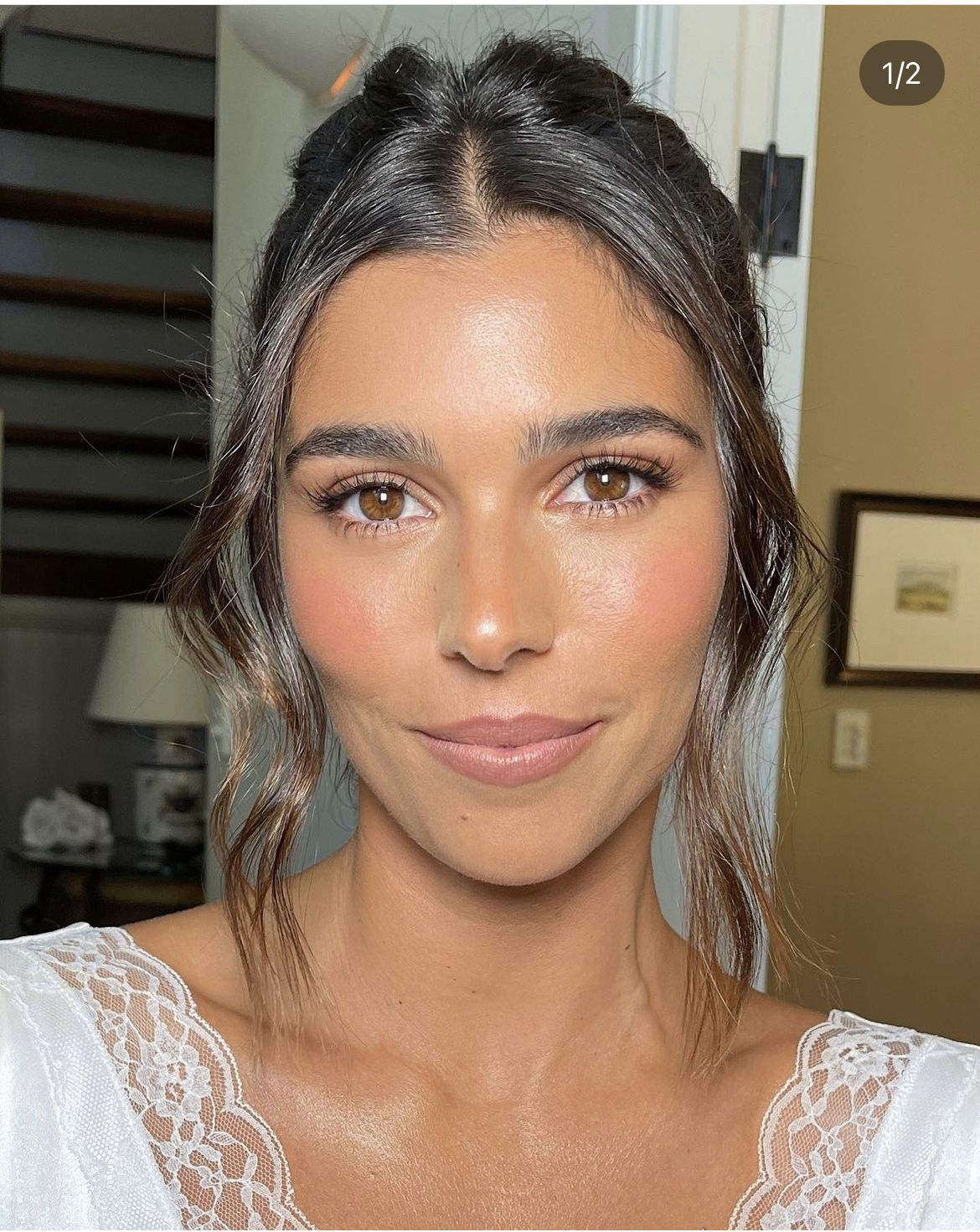 Rich golden bronze shadows across the lids with a warm honey tone on the lips.
