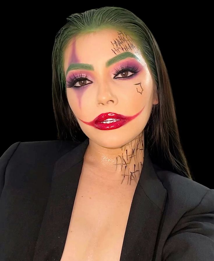 Woman wearing Joker-inspired Halloween makeup with green hair, purple eyeshadow and an exaggerated red smile